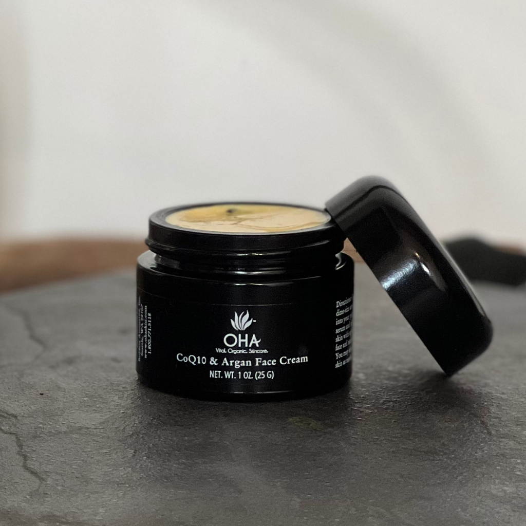 Organic antioxidant face cream in a glass bottle