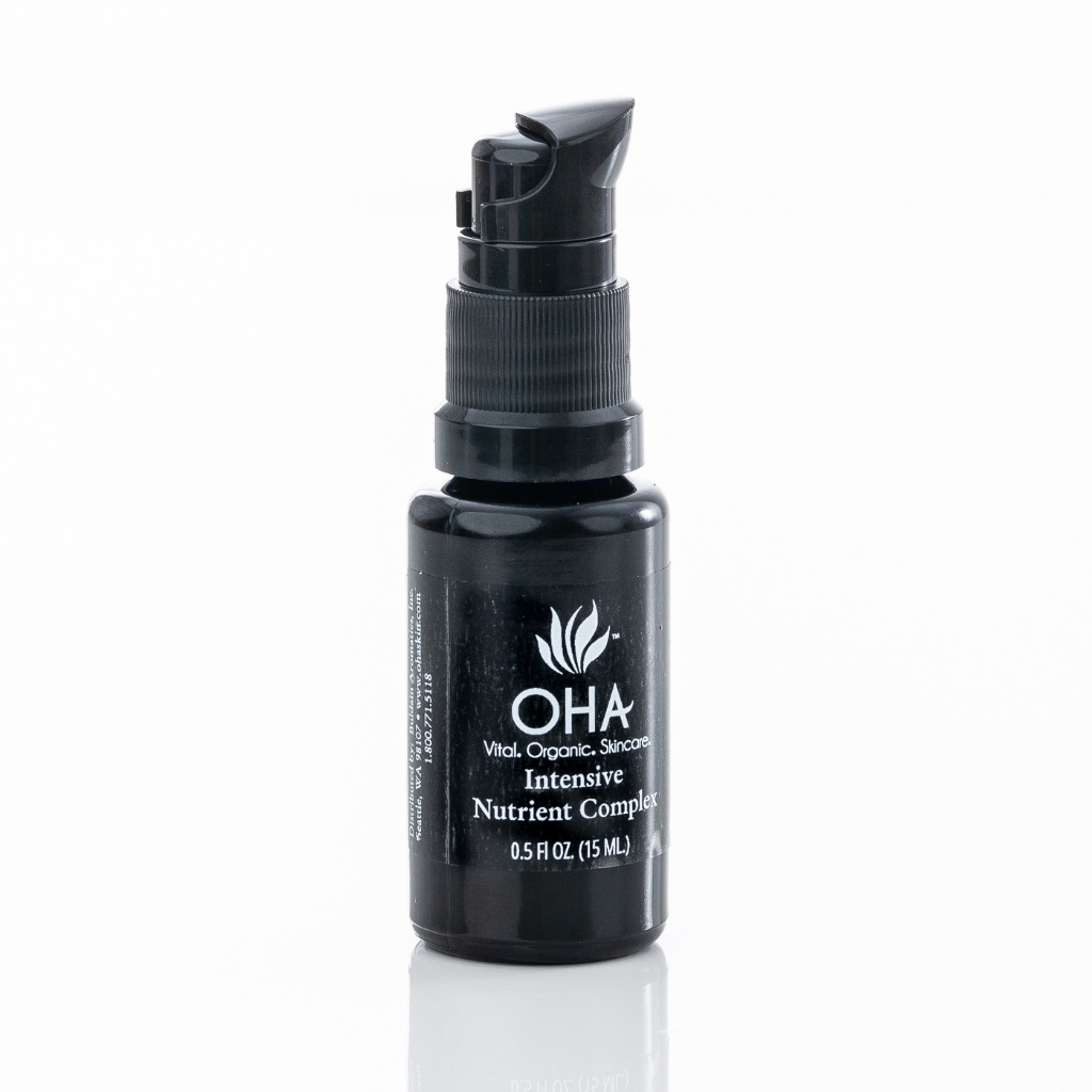 Organic anti-aging recovery serum in a glass bottle