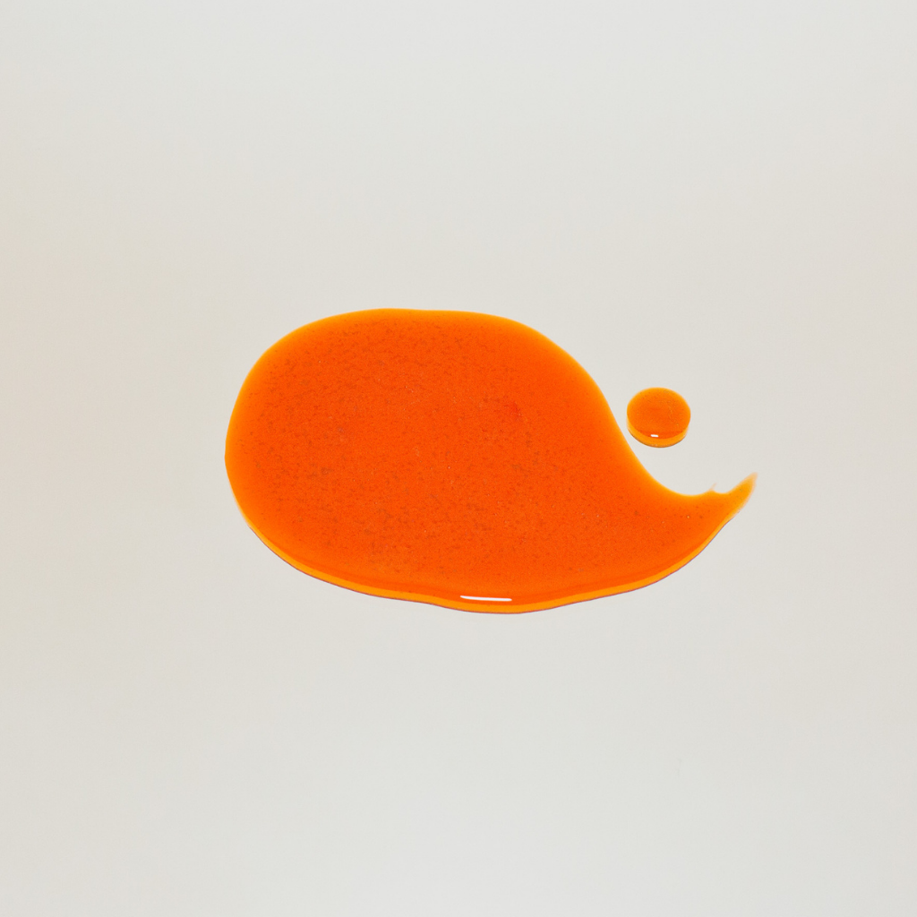 Texture and orange color of potent anti-aging serum