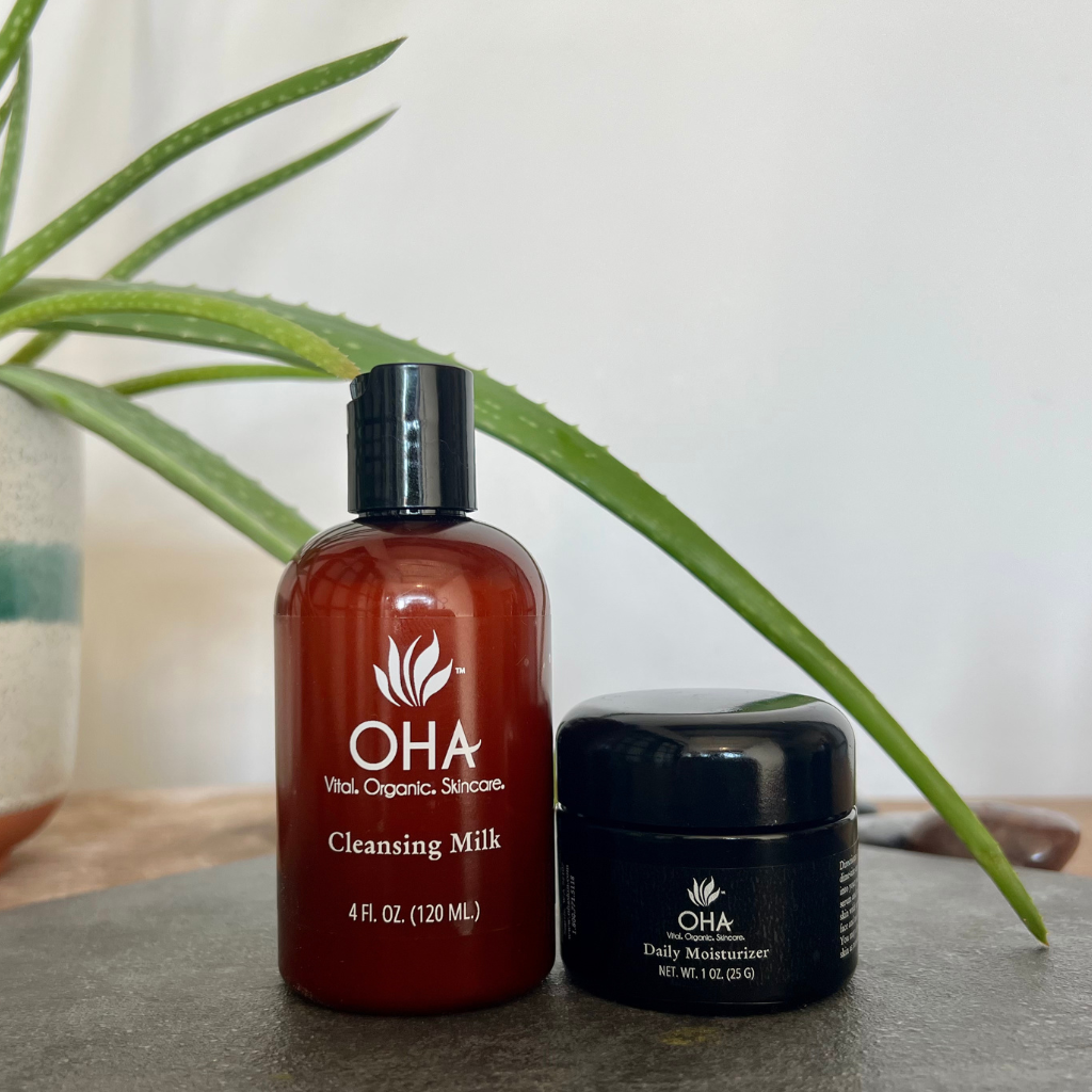organic cleansing milk and jar of daily moisturizer