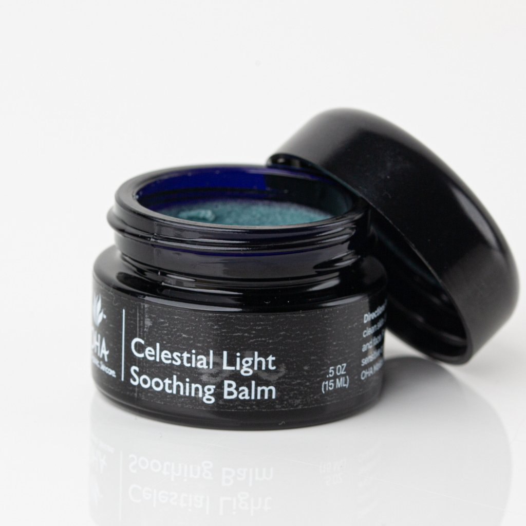 Blue soothing facial balm in black container