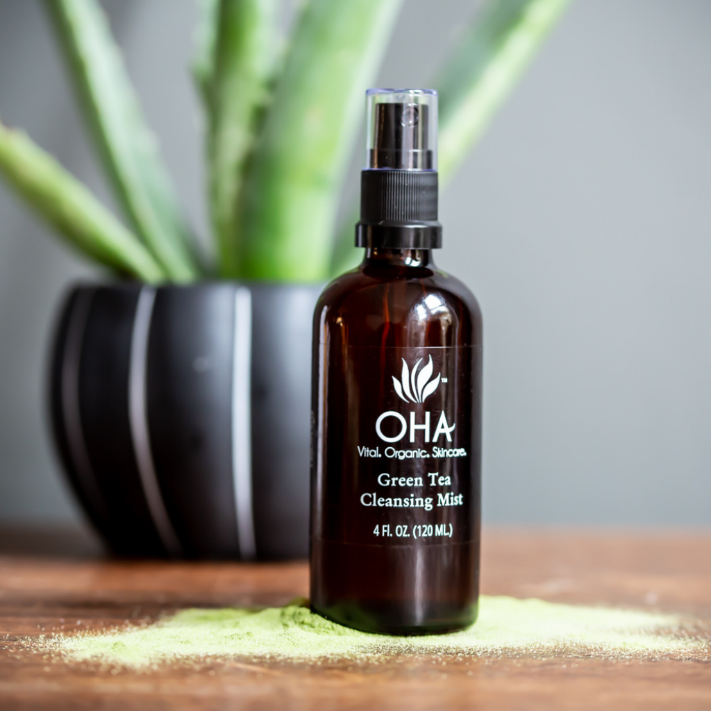 facial mist with green tea in glass spray bottle 